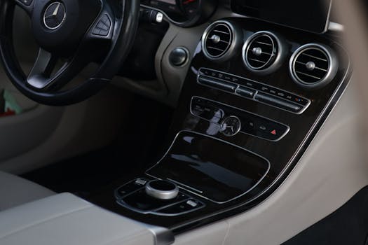 Sleek luxury car interior showcasing modern dashboard with premium features.