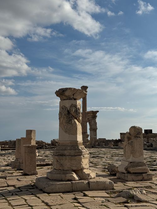 Free Explore ancient Roman ruins with historic columns under a clear blue sky. Stock Photo