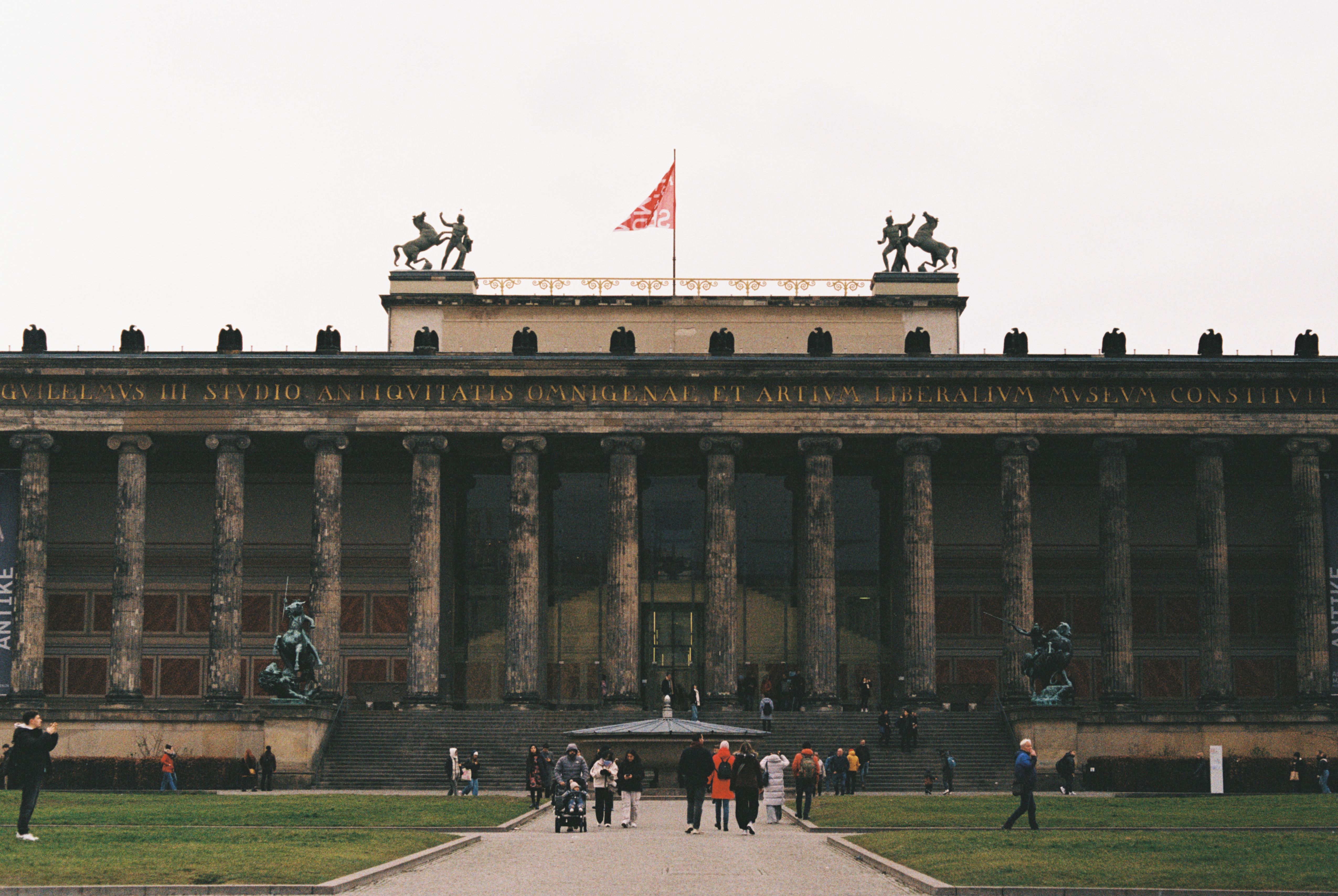 Discover the neoclassical architecture of Altes Museum in Berlin, Germany, with its stunning columns and sculptures.