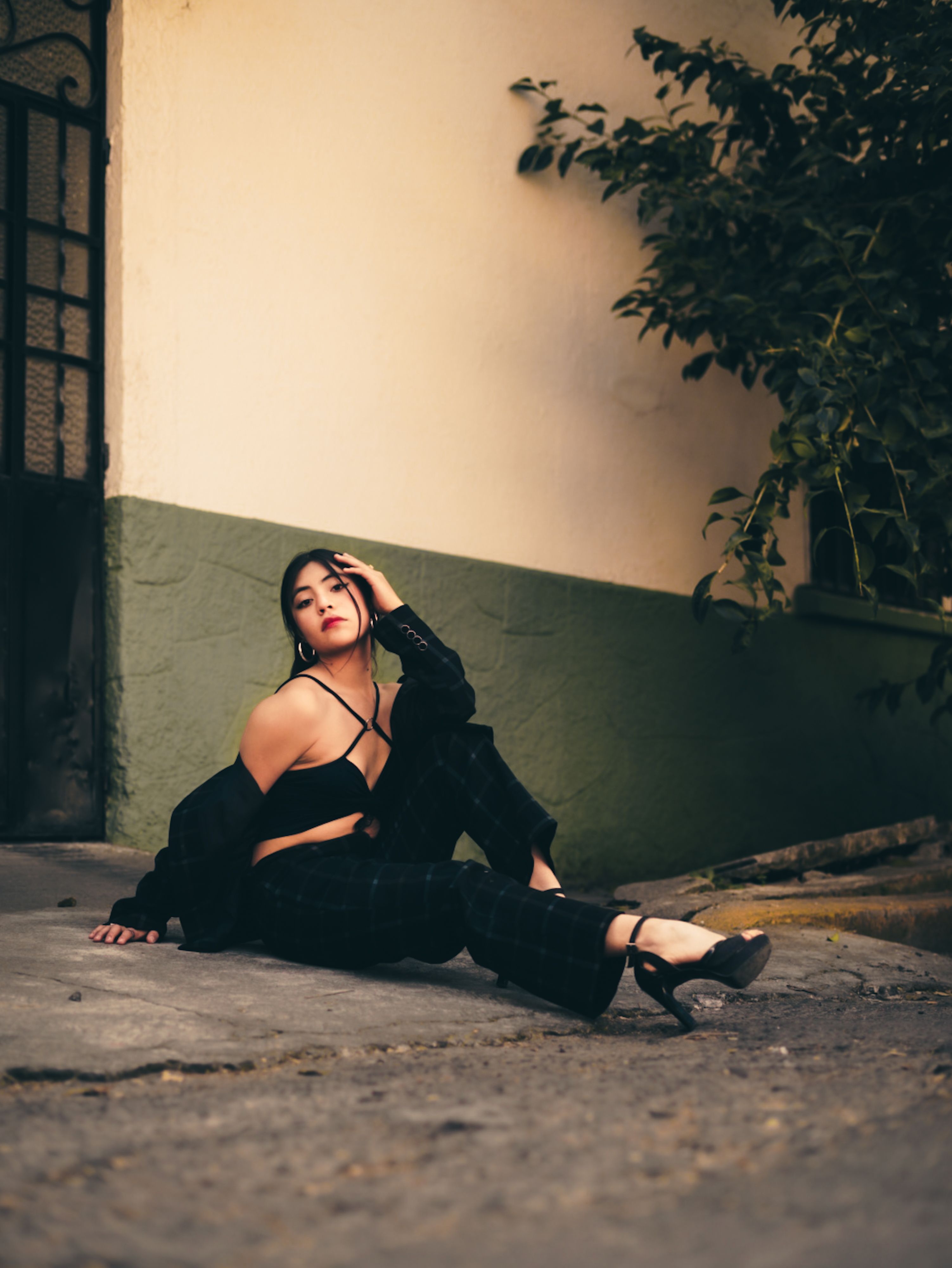 Stylish Woman Posing Outdoors in Urban Setting · Free Stock Photo