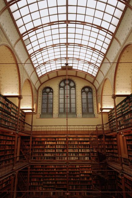 Stunning architectural view of the iconic Rijksmuseum library's interior in Amsterdam, Netherlands.