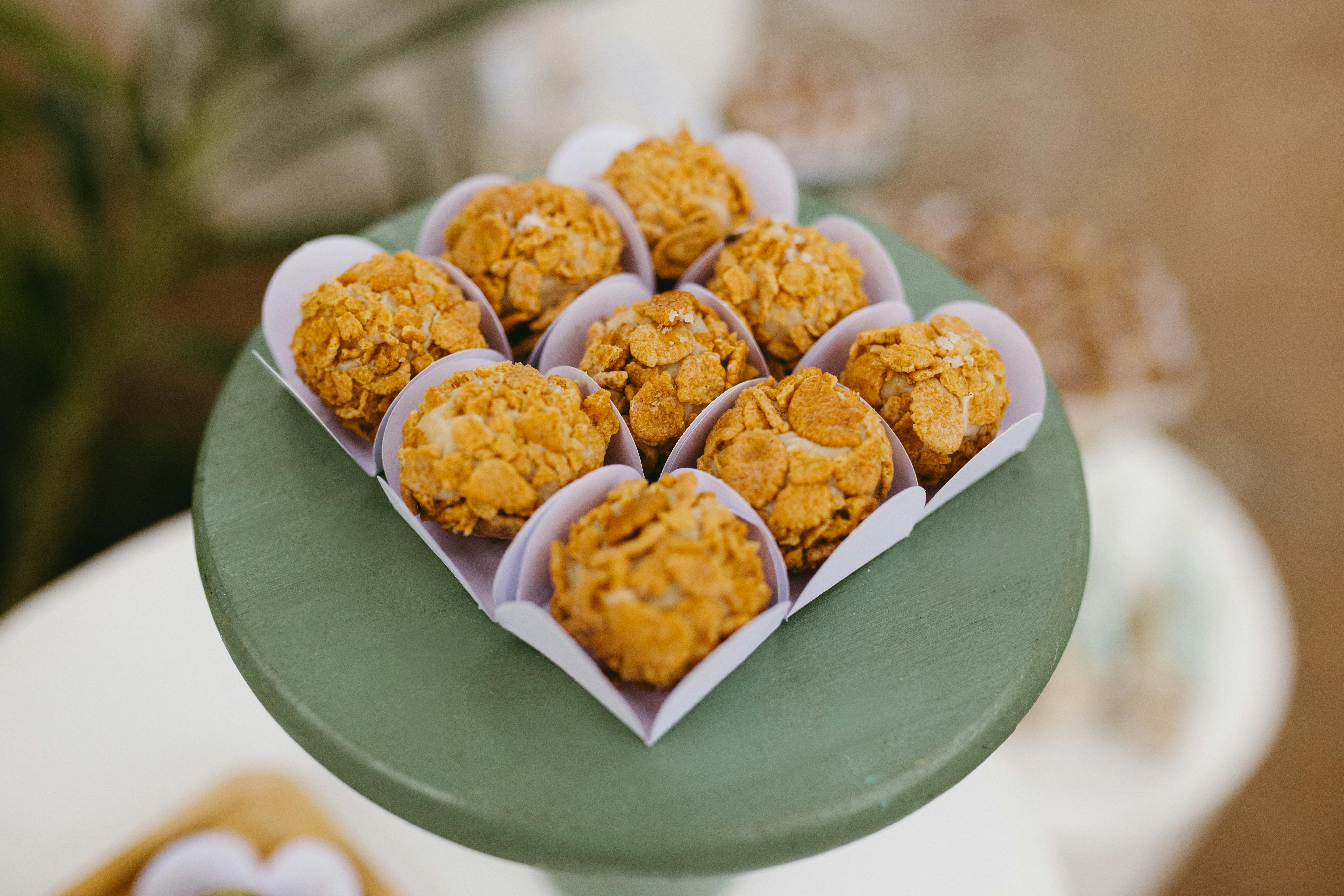 Close-up of traditional brigadeiros on a decorative pedestal, perfect for celebrations.