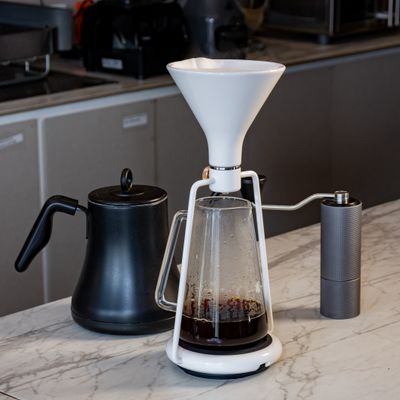Pour-over coffee set on a marble counter — Blanca Isela on Pexels