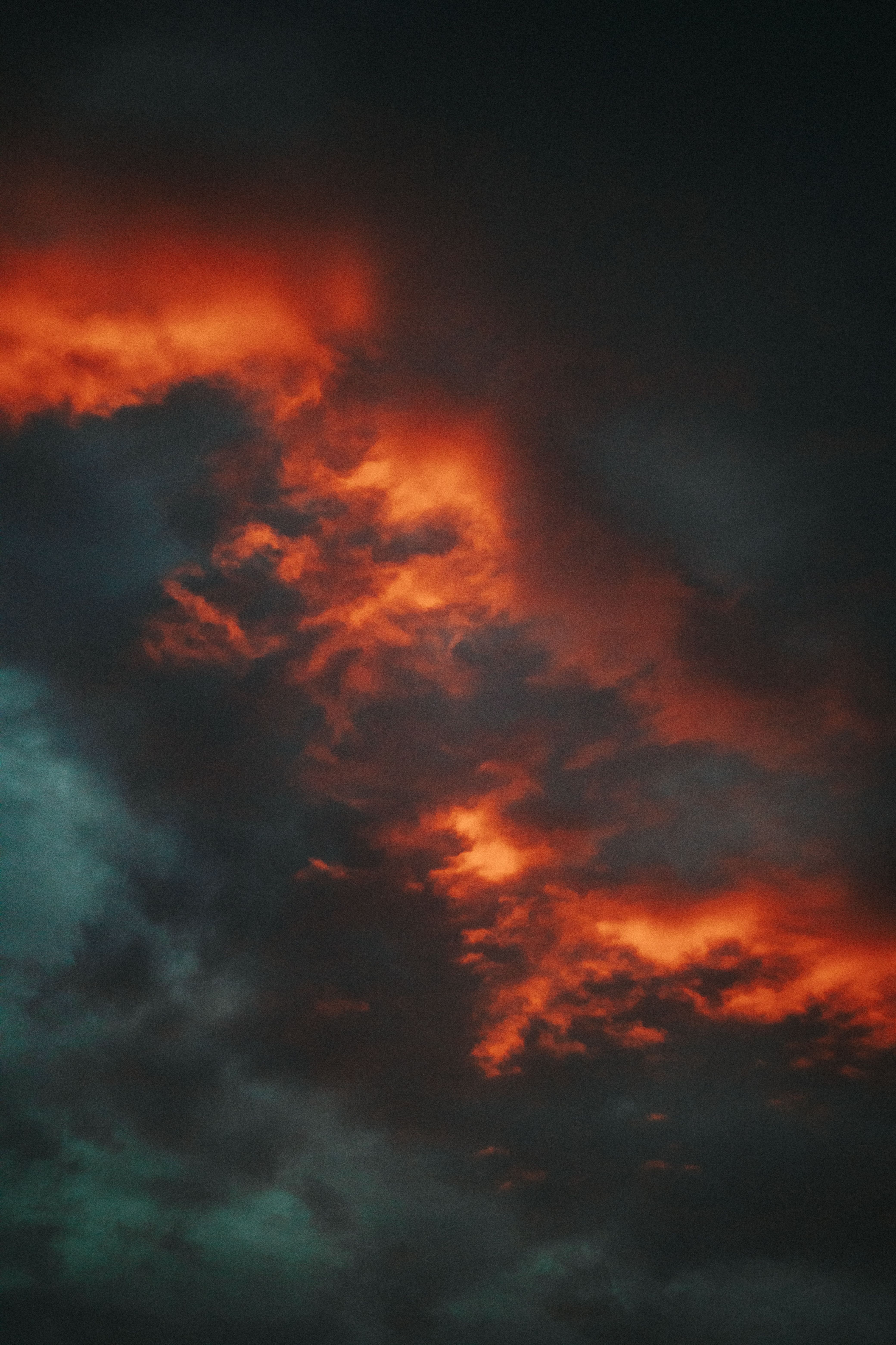 Moody Sunset Clouds with Fiery Red Highlights · Free Stock Photo
