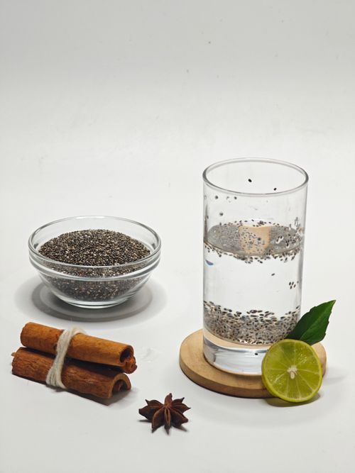 Free Refreshing chia seed water with lime and cinnamon sticks for a healthy lifestyle. Stock Photo