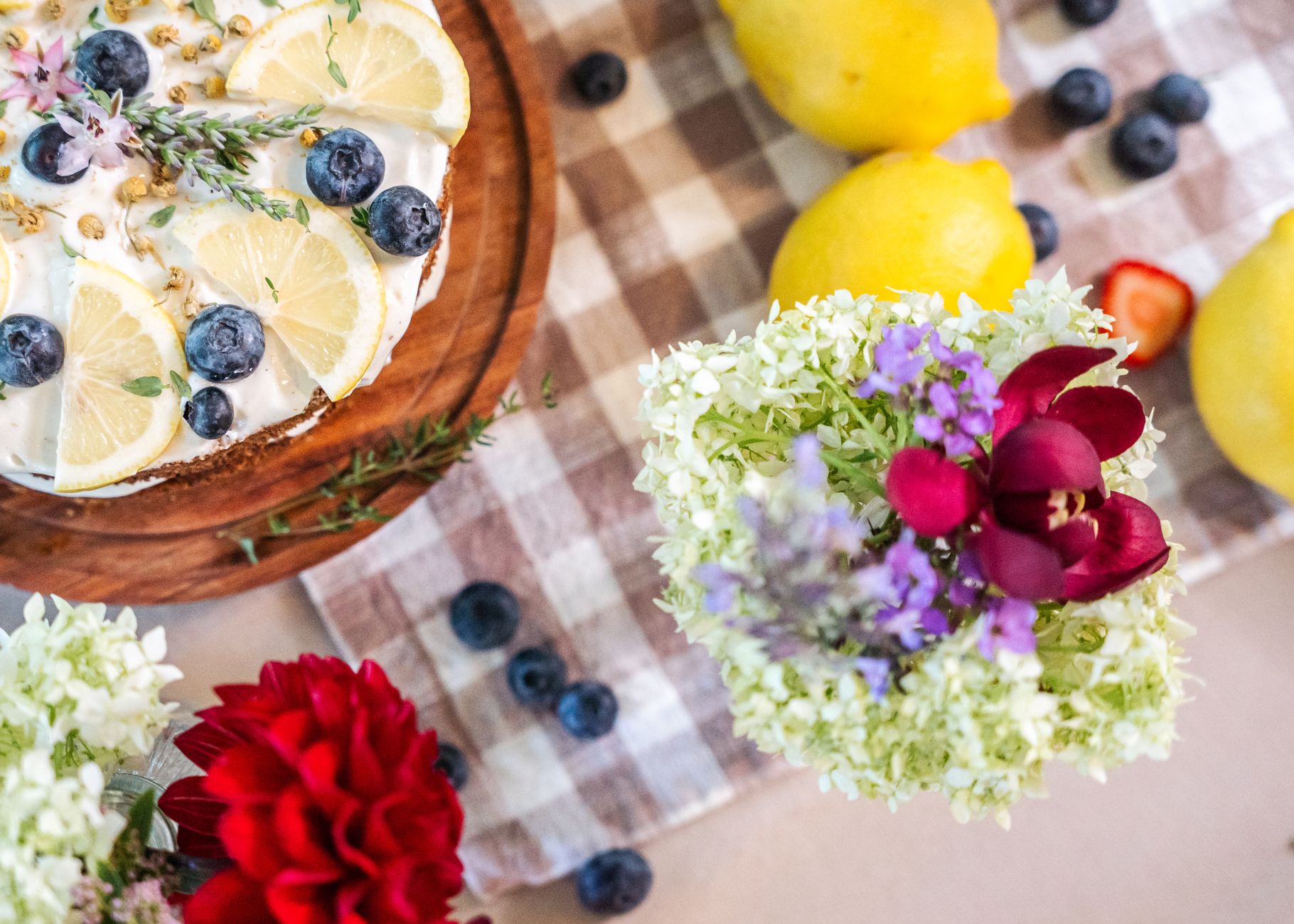 Close-up of vegan lemon blueberry bars with lemon zest garnish