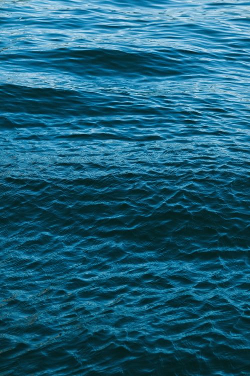 Free Capture of gentle ocean waves with turquoise hues and calming motion, perfect for tranquil backgrounds. Stock Photo