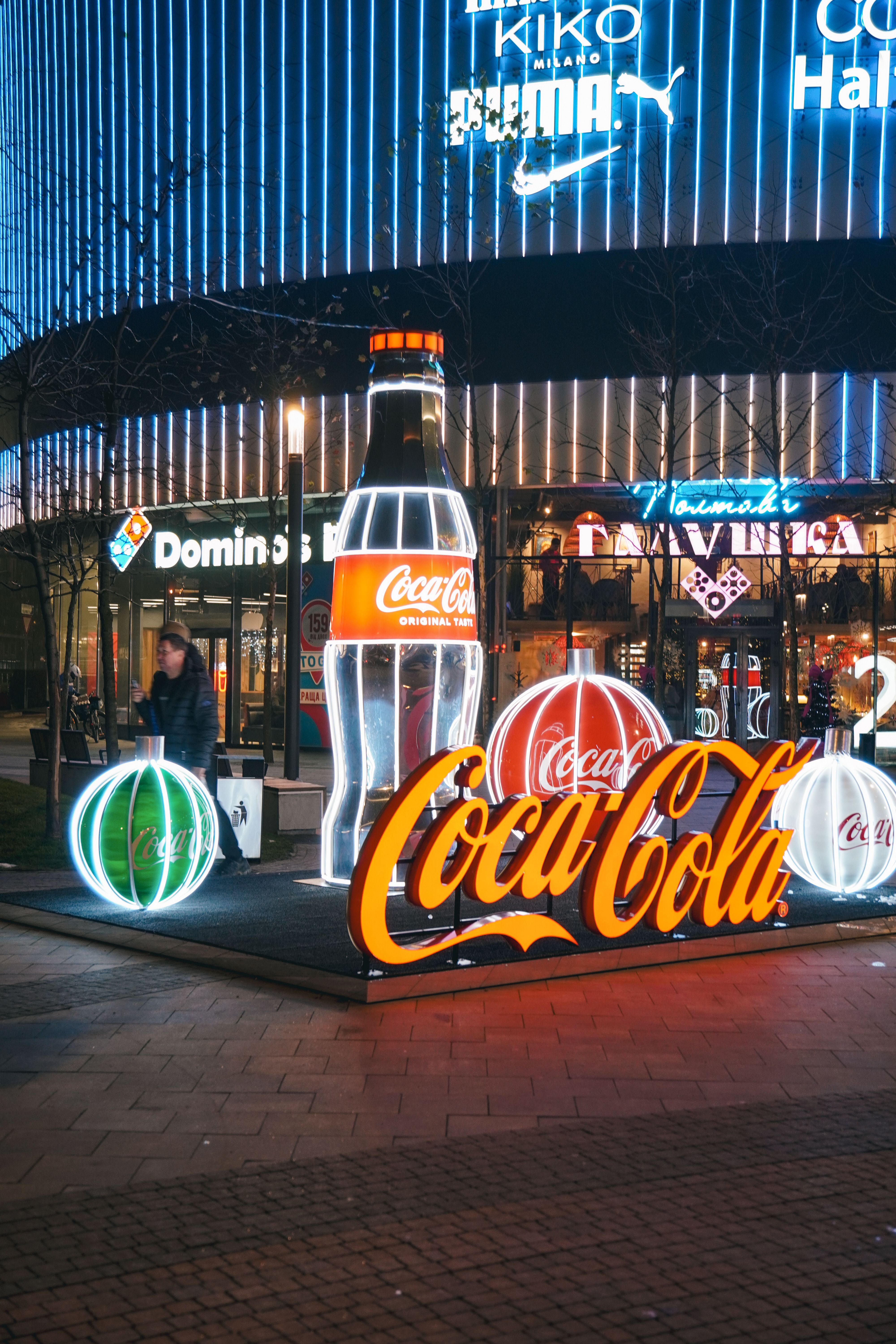 Vibrant Night Scene at Coca-Cola Display in Kyiv · Free Stock Photo