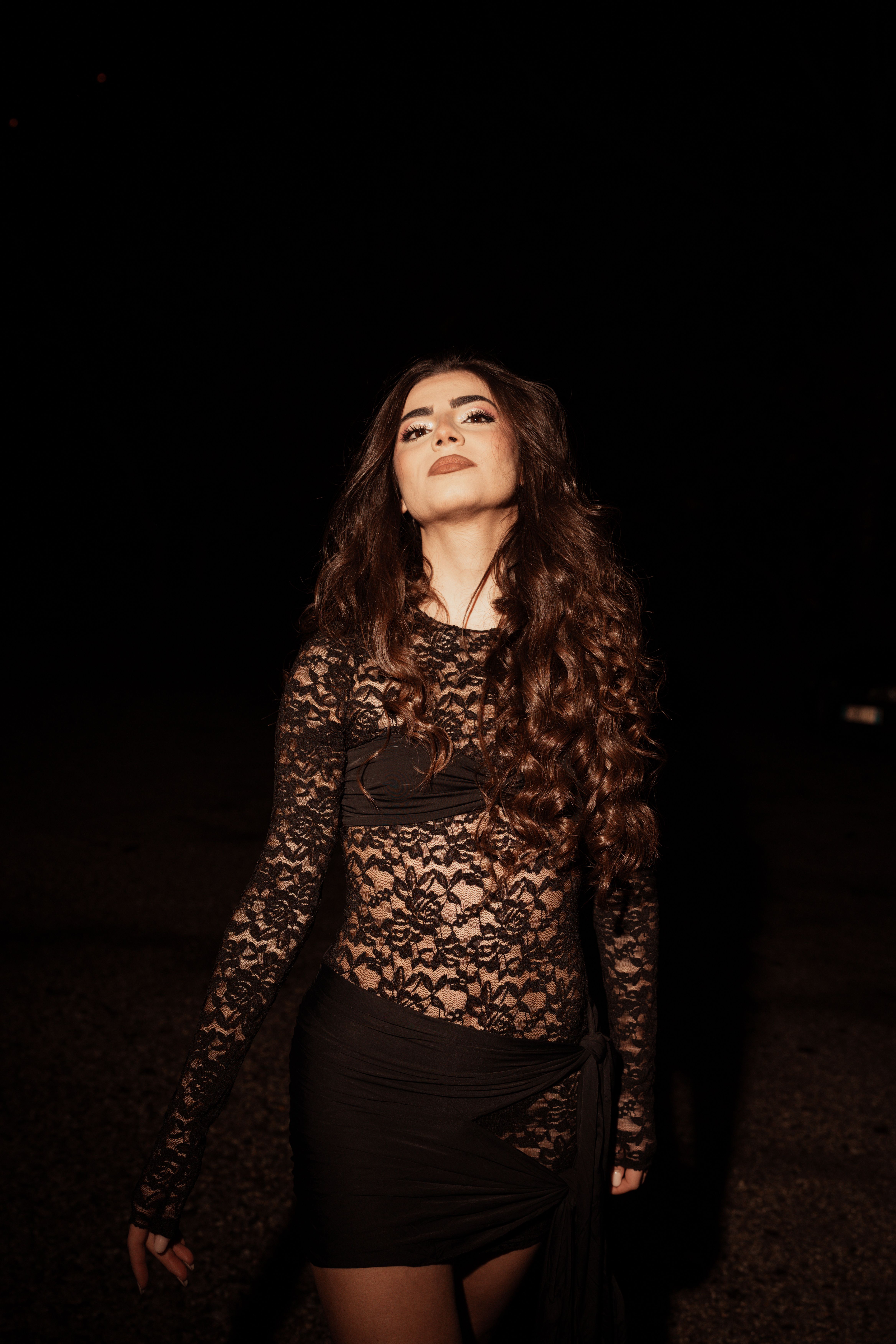Elegant Woman in Black Lace Dress at Night · Free Stock Photo