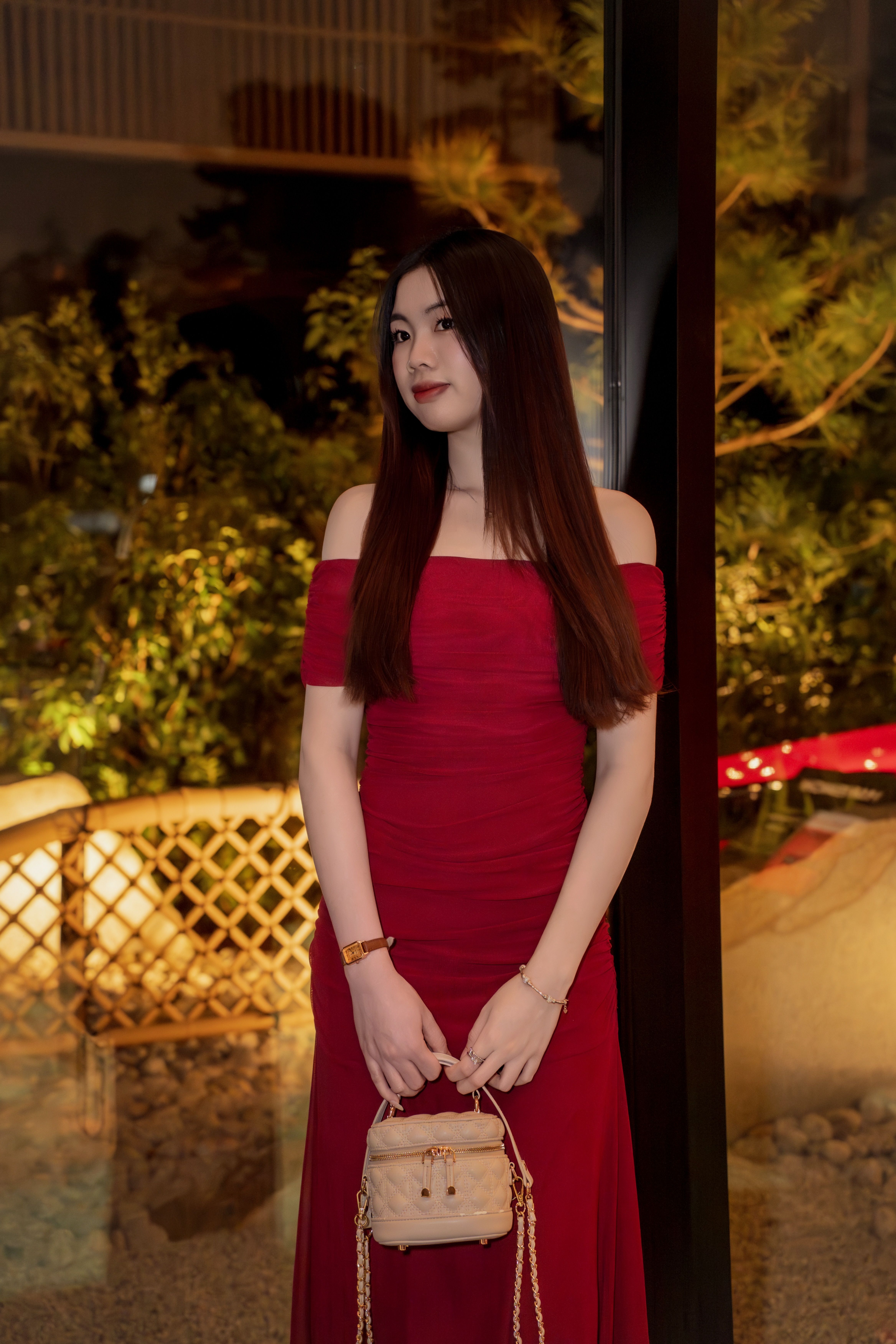 Elegant Woman in Red Dress at Evening Event · Free Stock Photo