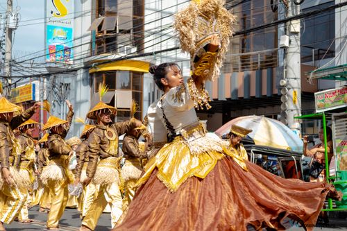 Free Colorful street festival with dancers in traditional attire, Tarlac City, Philippines. Stock Photo