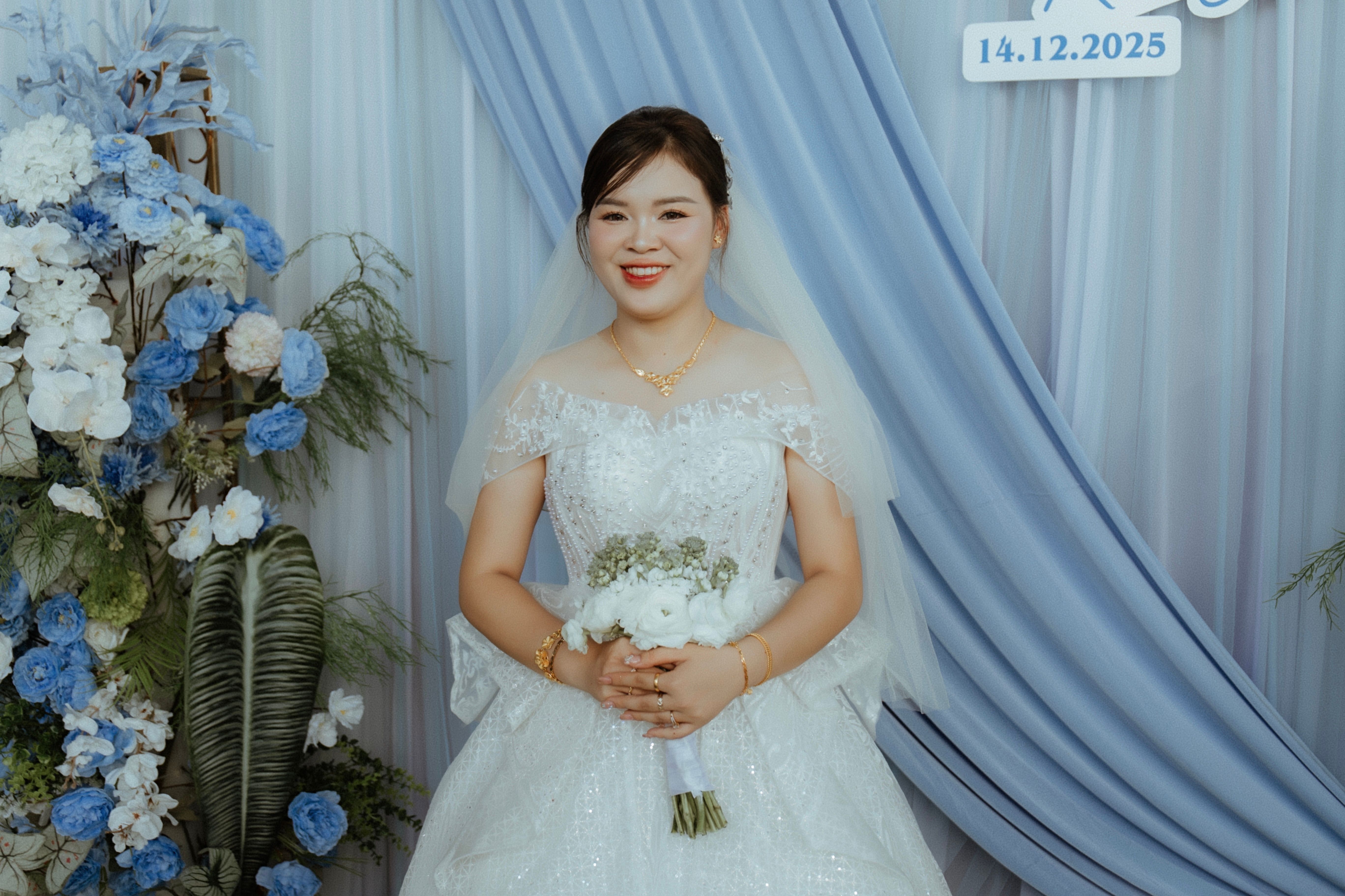 Elegant Bride Holding Bouquet in Wedding Dress · Free Stock Photo