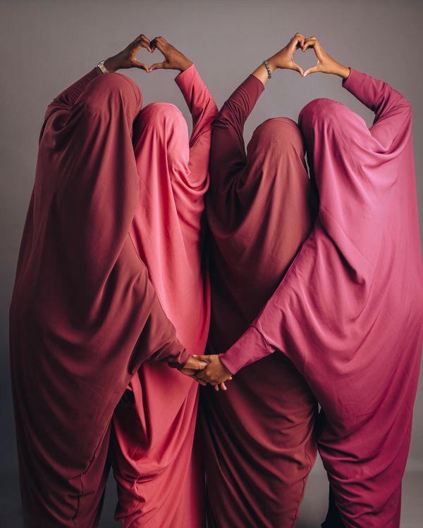 Women in Matching Hijabs Creating Heart Gesture · Free Stock Photo