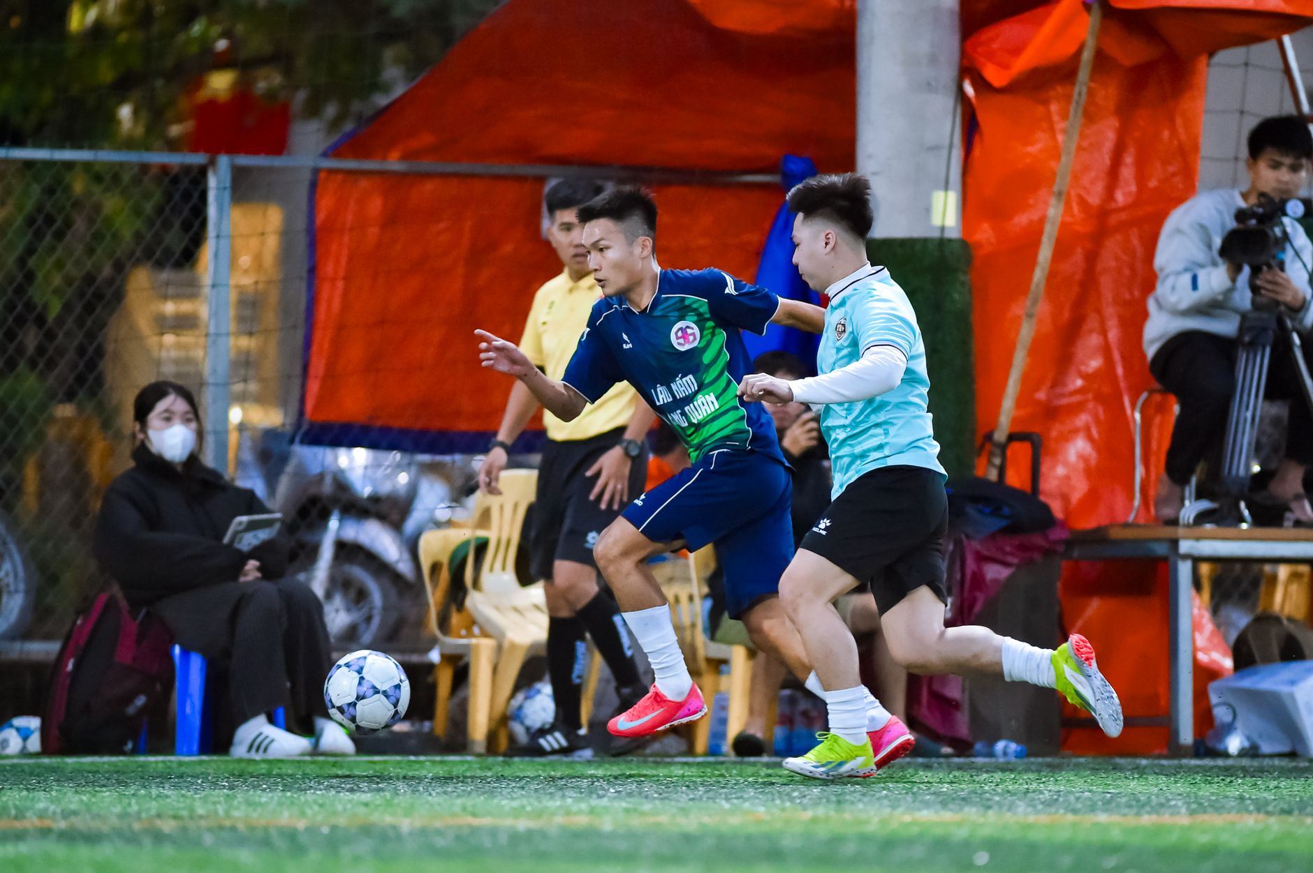 A thrilling local football match showcasing the passion for sports in Hà Nội, Vietnam.