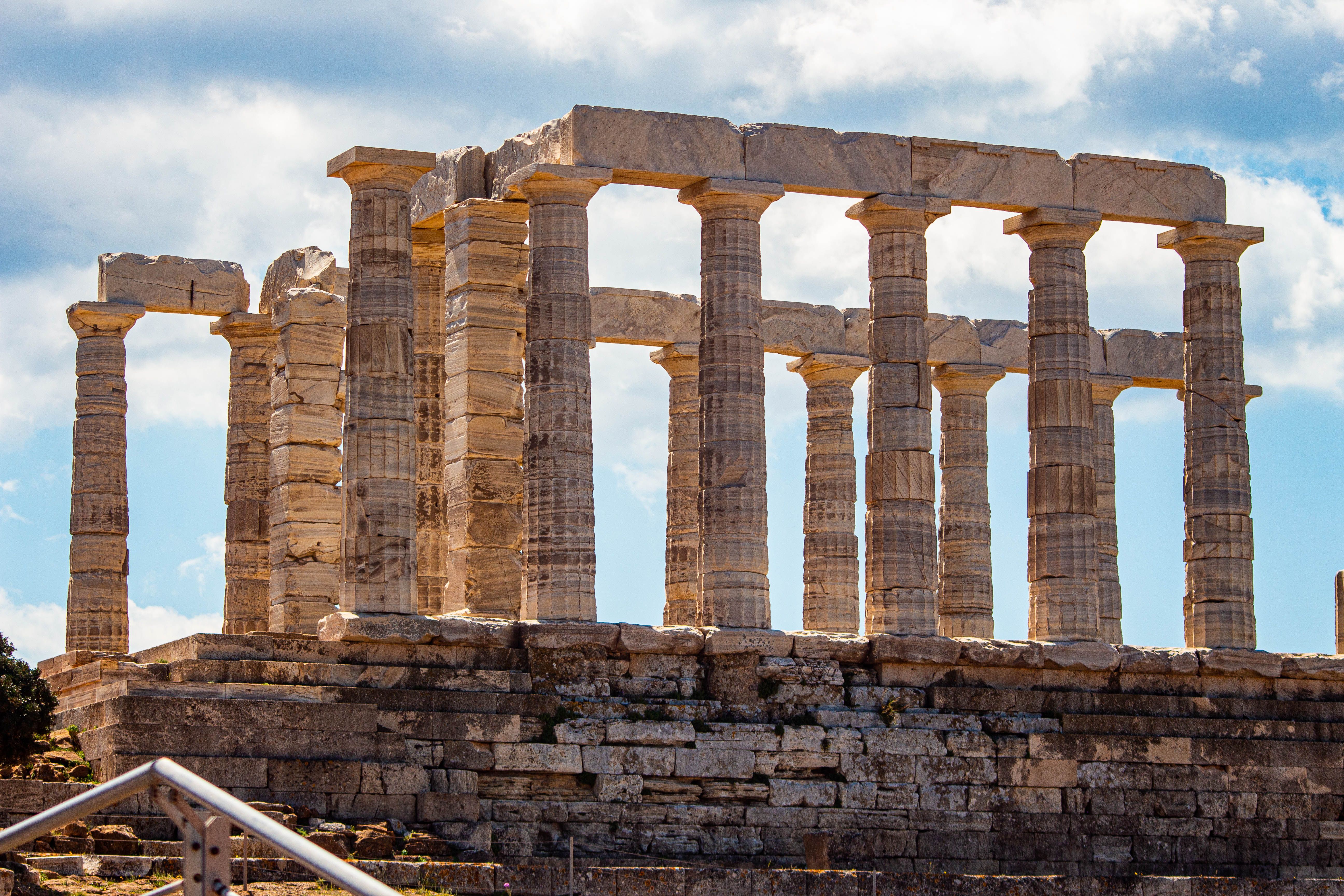 Ancient Greek Temple Ruins Under Blue Sky · Free Stock Photo
