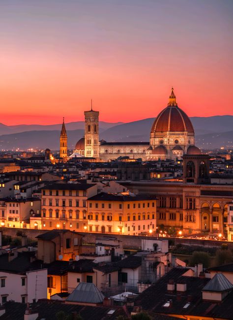 Captivating sunset over Florence featuring the iconic Florence Cathedral and city's historic skyline.