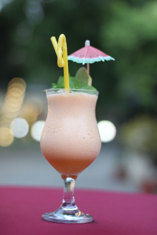 Refreshing Tropical Fruit Cocktail with Umbrella · Free Stock Photo