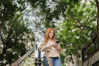 Outdoor Urban Scene with Woman Using Phone