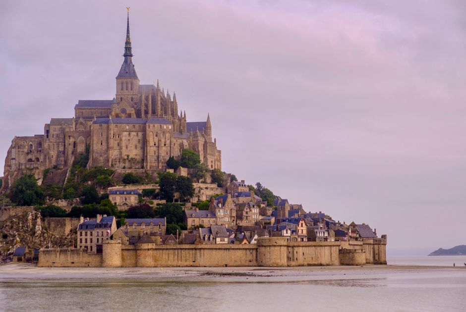 Mont Saint-Michel abbey rising from the bay at high tide