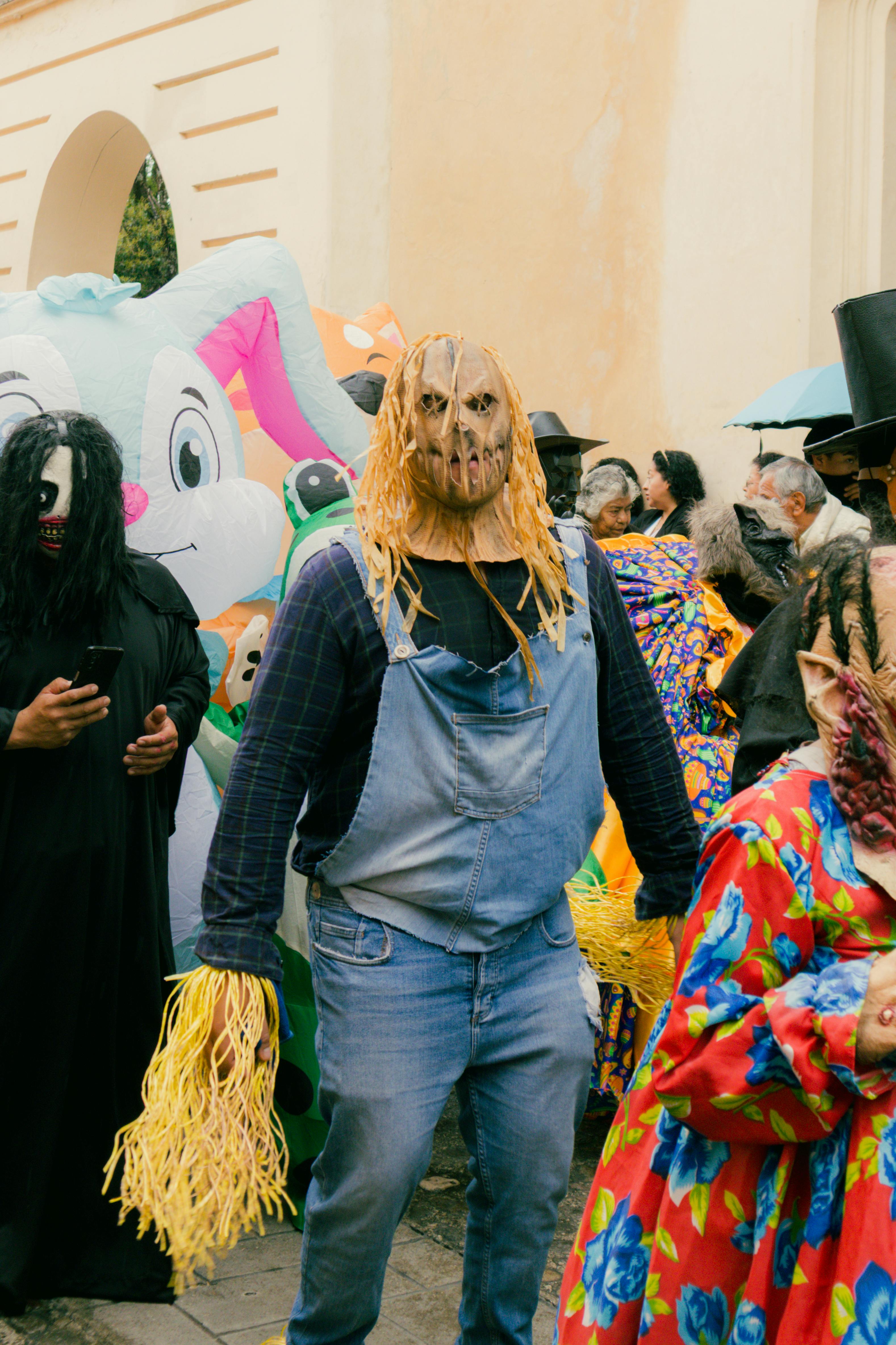 Costumed performers at a colorful cultural festival in San Cristóbal de las Casas, Mexico. Vibrant and festive.
