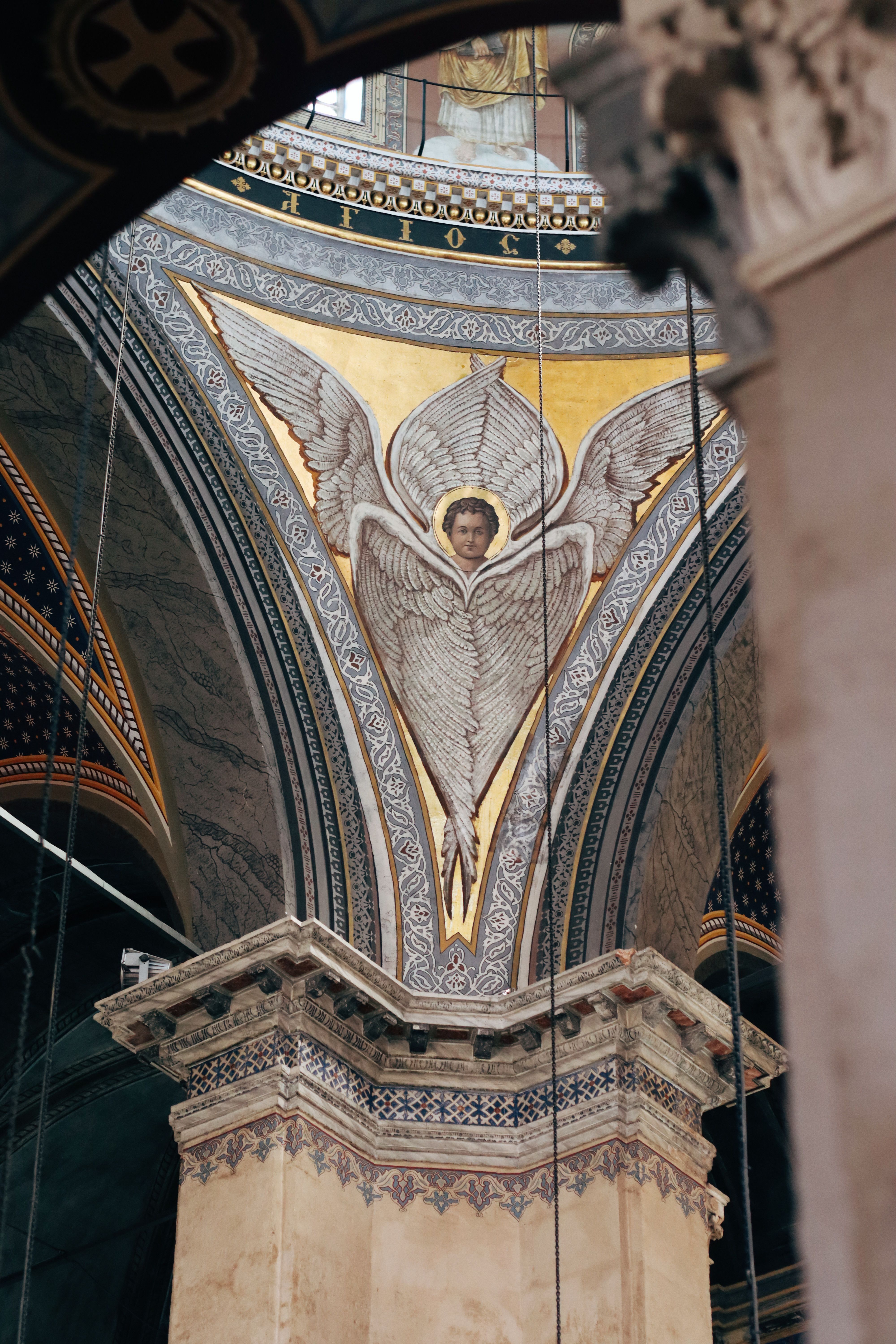 Close-up of stunning mosaic art in Hagia Sophia showcasing intricate religious symbolism.
