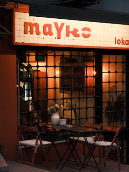 Warm evening at an outdoor cafe, inviting atmosphere with soft lighting.