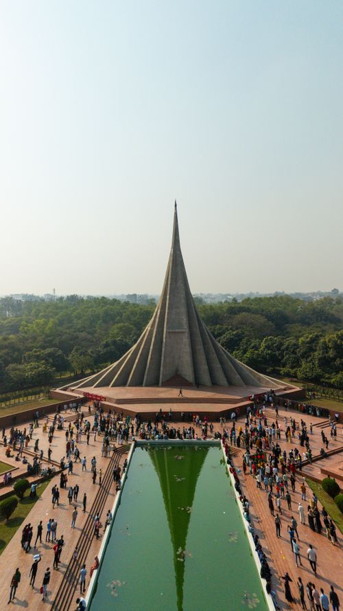 Free Aerial view of the National Martyrs' Memorial in Savar, surrounded by visitors. Stock Photo