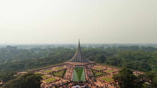 Free Stunning aerial view of National Martyrs' Memorial in Savar, Bangladesh, showcasing the iconic design and surrounding greenery. Stock Photo