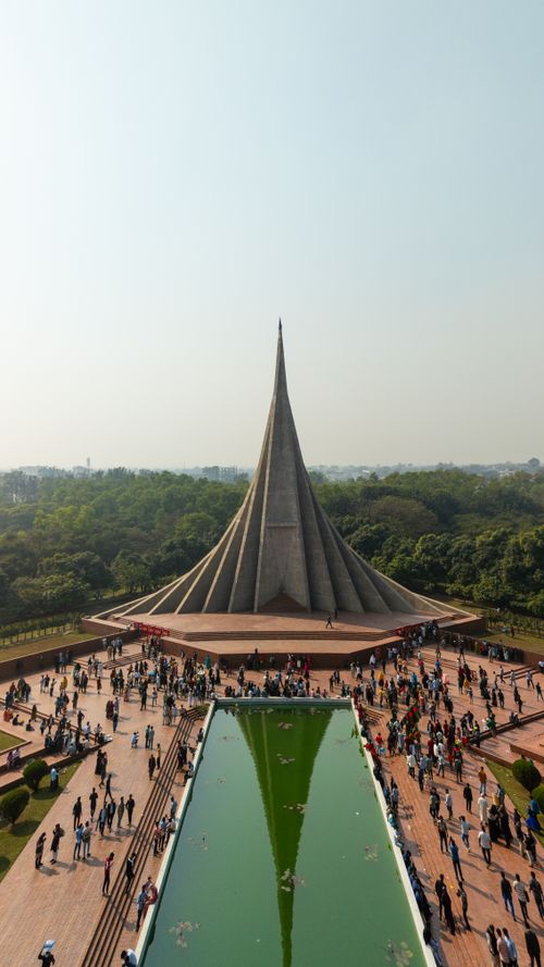 Free Aerial view of the National Martyrs' Memorial in Savar, Bangladesh on a sunny day. Stock Photo