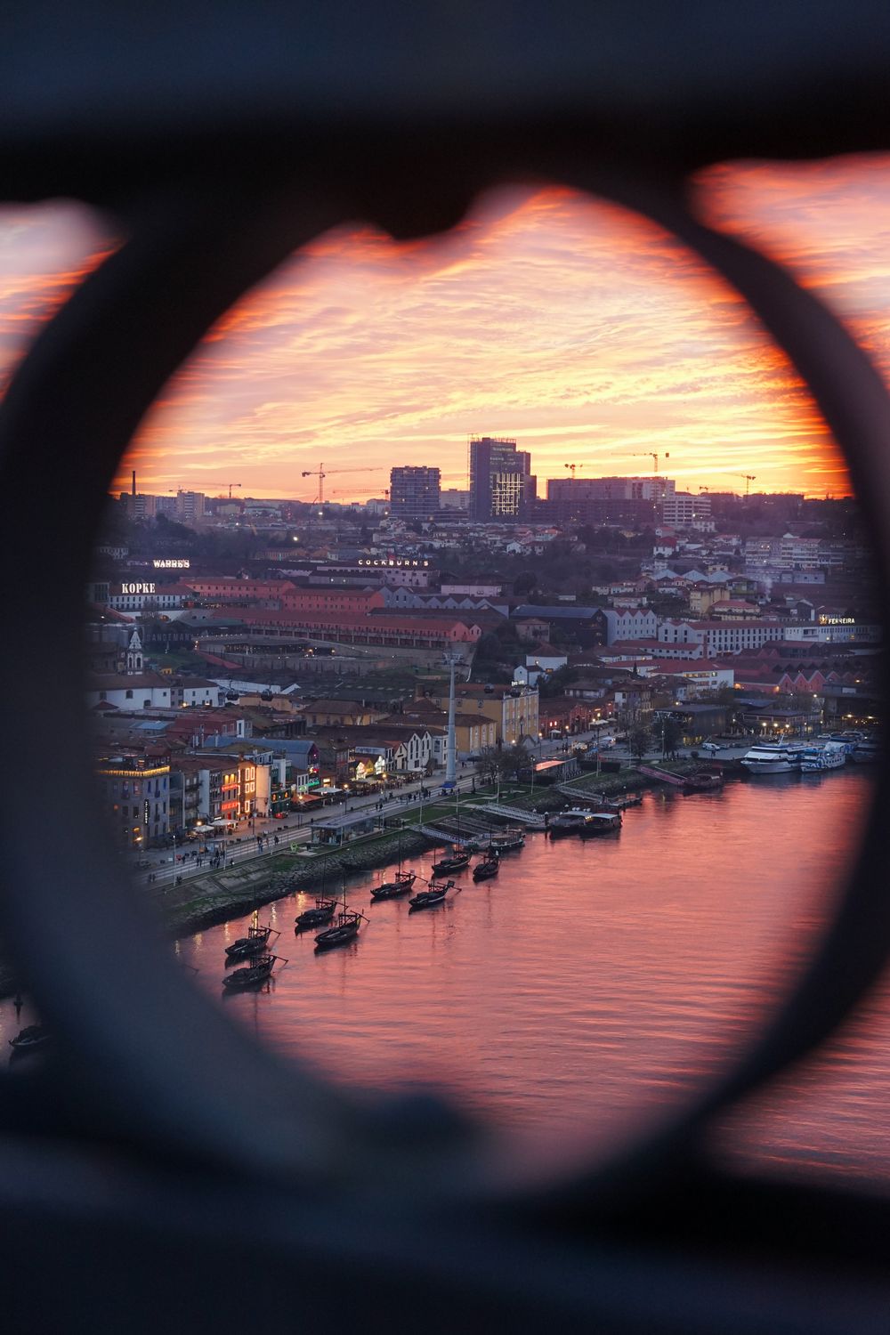 Vibrant Riverside Scenic Riverside City at Vibrant Sunset · Free Stock Photo