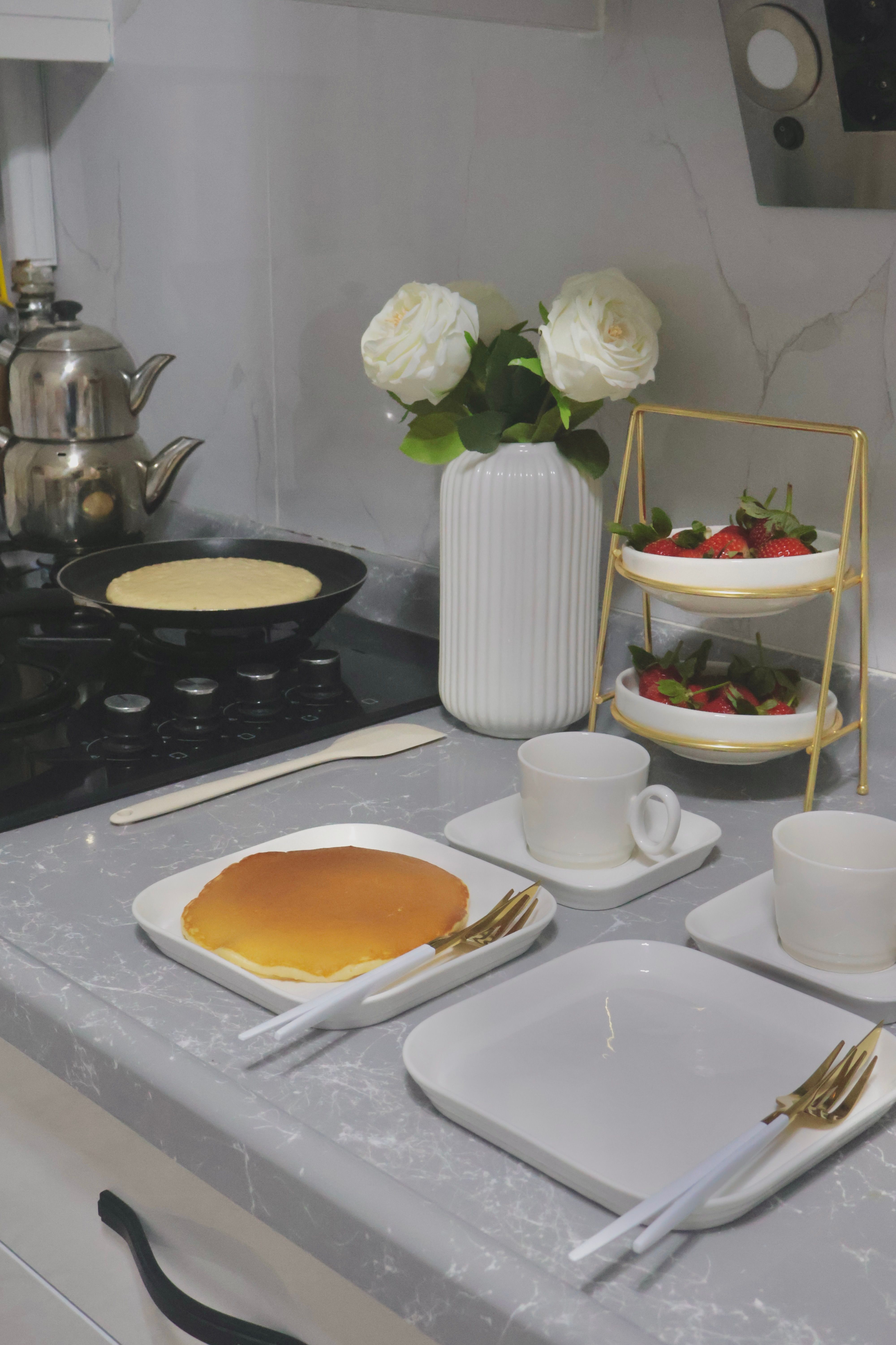 Cozy Kitchen Breakfast Setup with Pancakes · Free Stock Photo