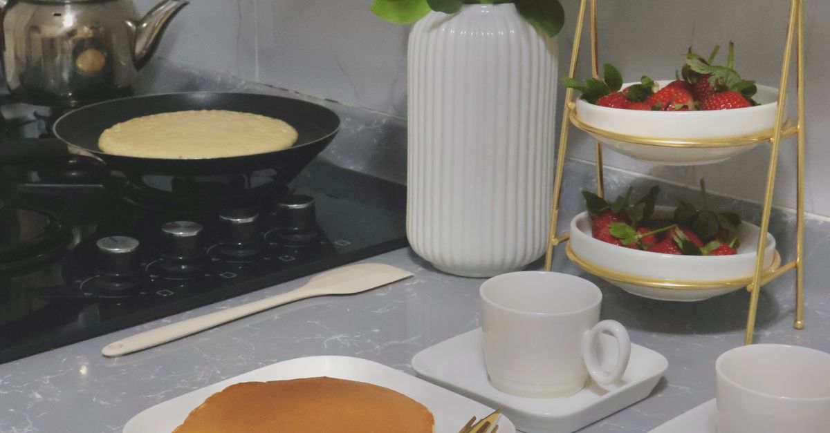 Breakfast Setup Kitchen Cozy Kitchen Breakfast Setup with Pancakes · Free Stock Photo