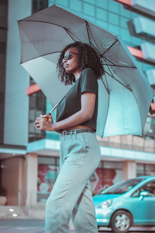 Free Photo of Woman Holding an Umbrella Stock Photo