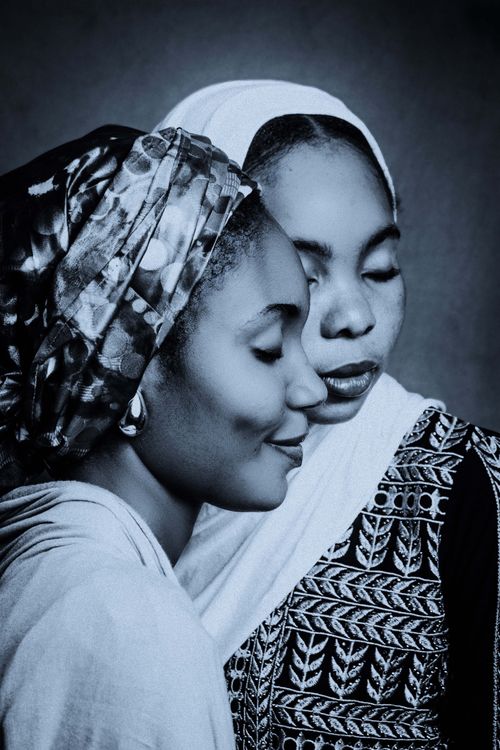 Free Two women sharing a tender moment, embracing in peaceful harmony. Stock Photo