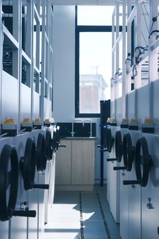 Sunlit industrial interior showcasing machinery and equipment in a clean and modern setting.