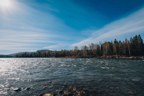 Free Beautiful autumn landscape of the Katun River in Altai, Russia, under clear blue skies. Stock Photo