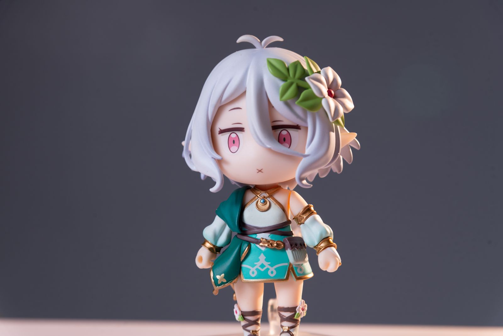Anime-style figurine representing the campaign's stylized chibi visual direction