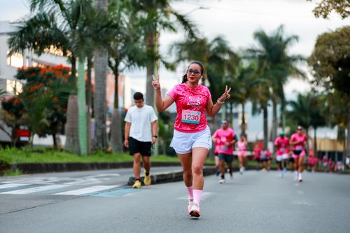 Free Group of women participating in outdoor charity marathon wearing pink. Stock Photo