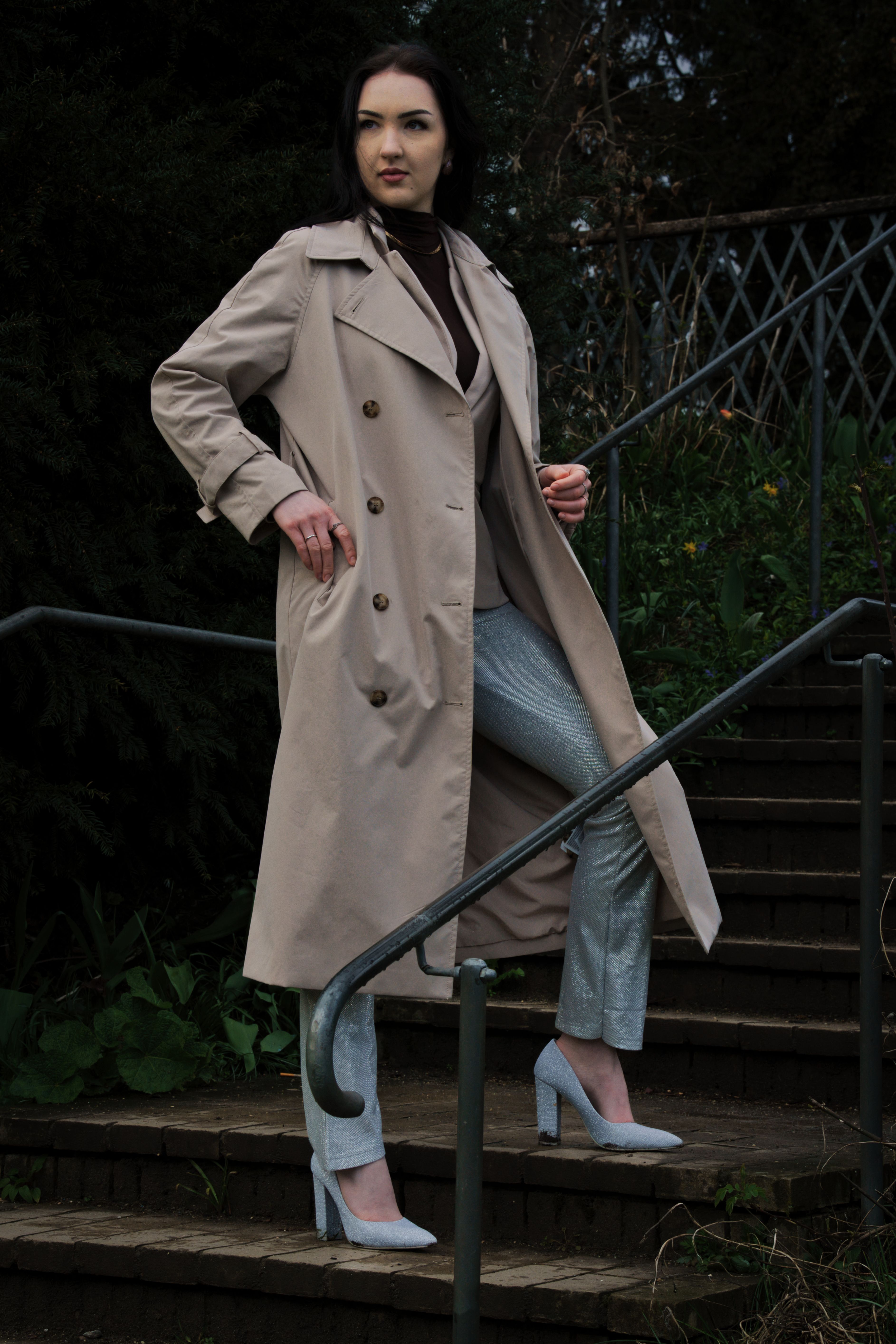 Elegant Woman Posing in Stylish Trench Coat Outdoors · Free Stock Photo