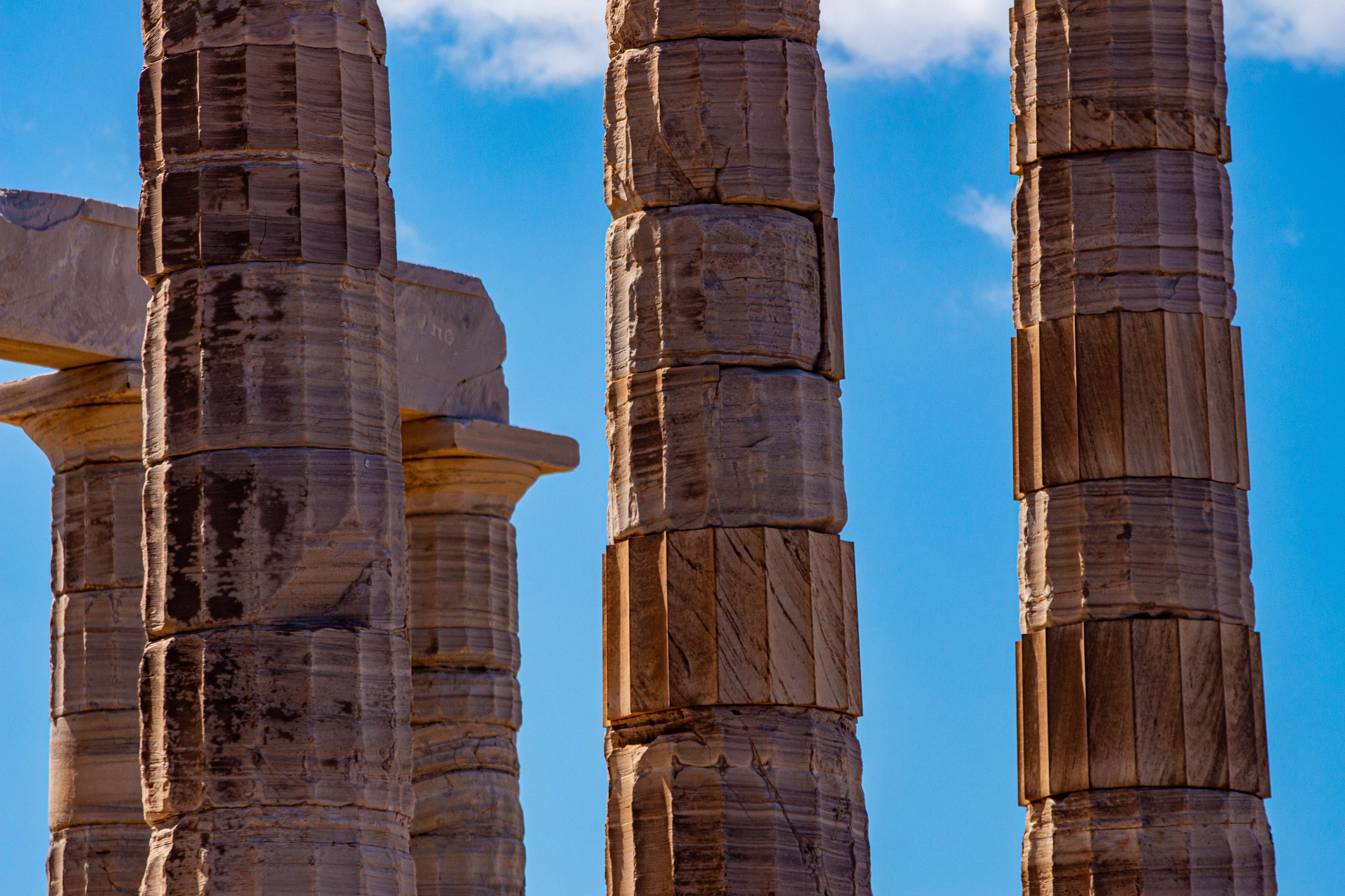 Ancient Greek Columns under Blue Sky · Free Stock Photo