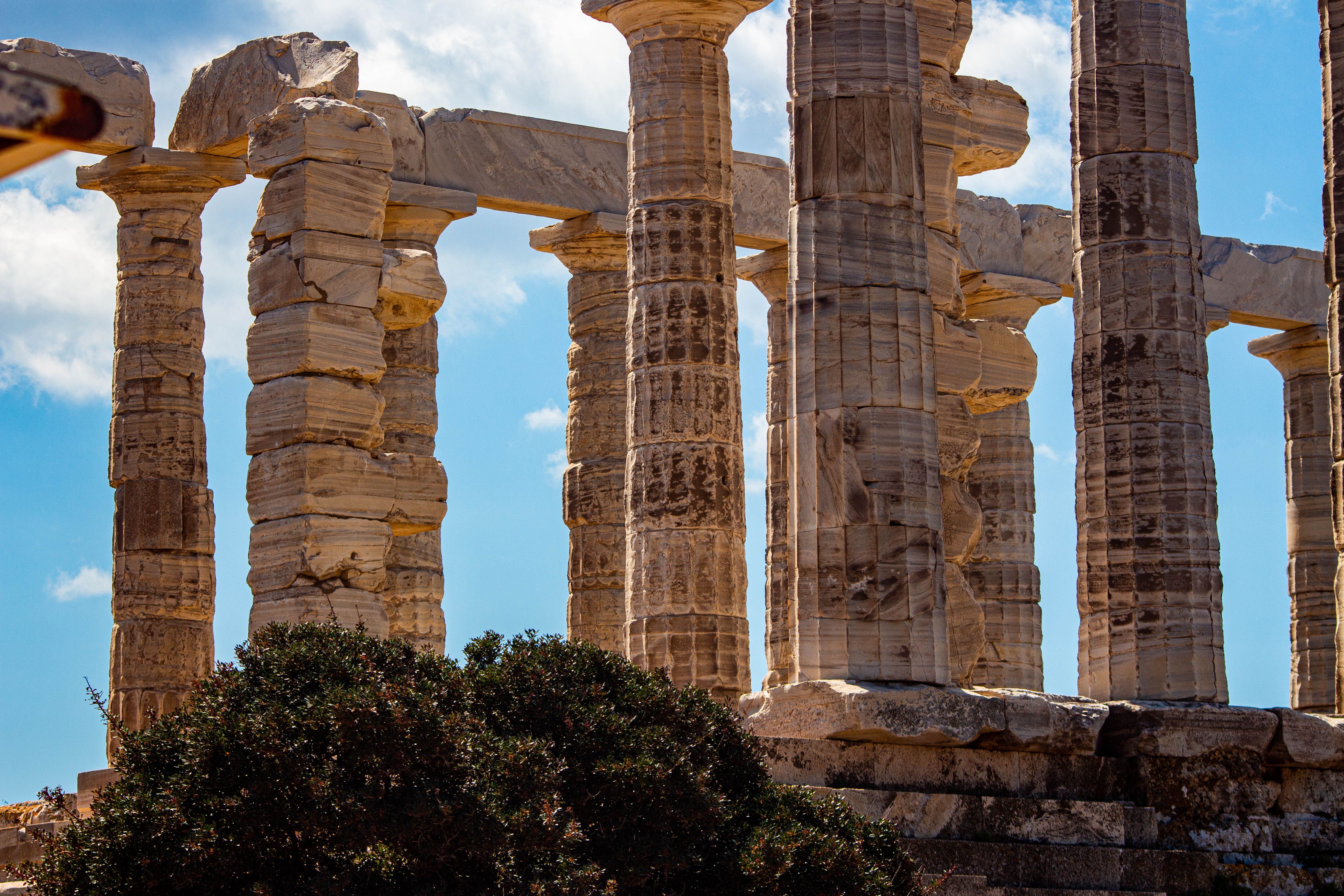 Ancient Greek Temple Ruins Against Blue Sky · Free Stock Photo