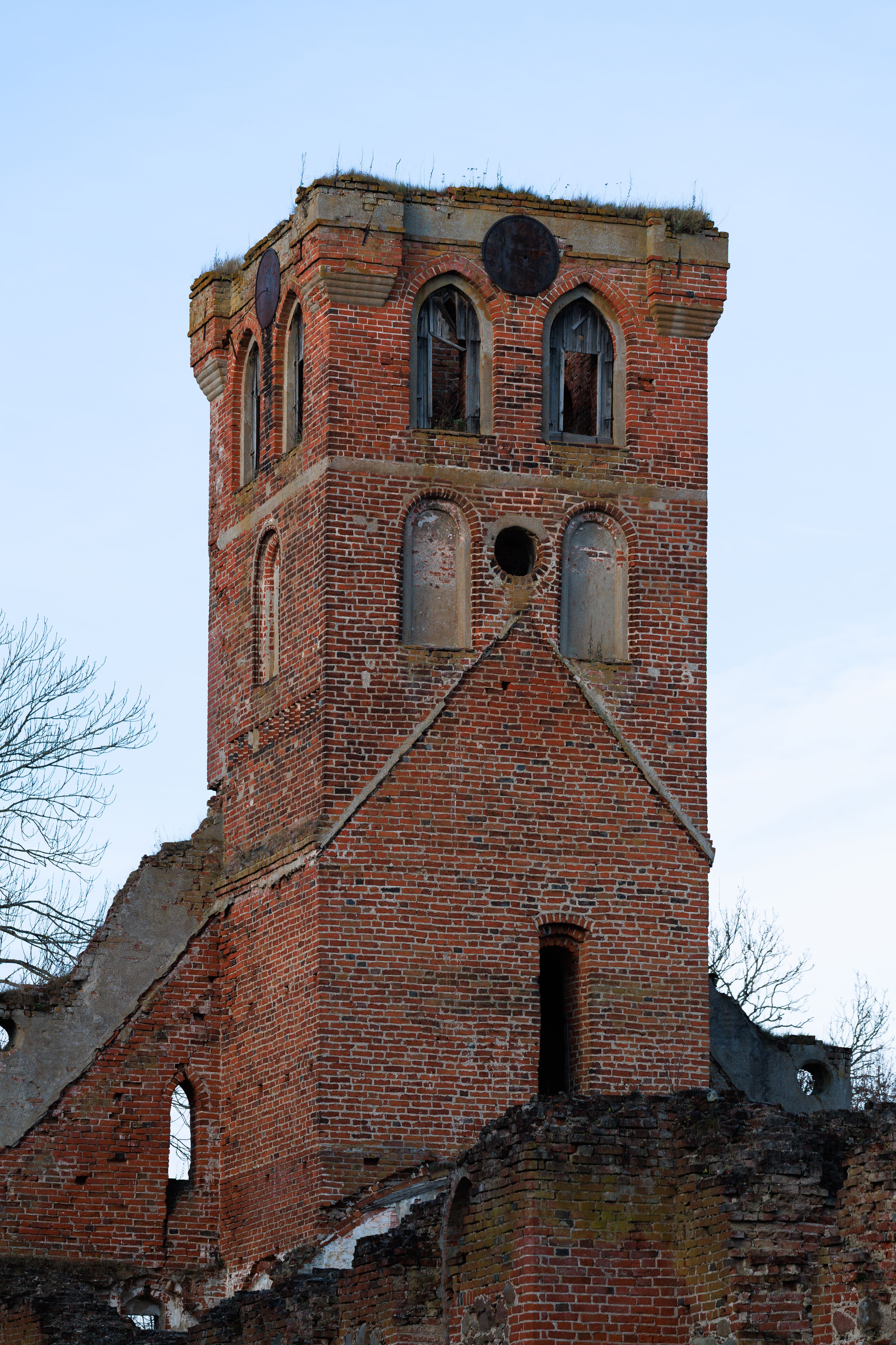 Historic Brick Tower Against Clear Sky · Free Stock Photo