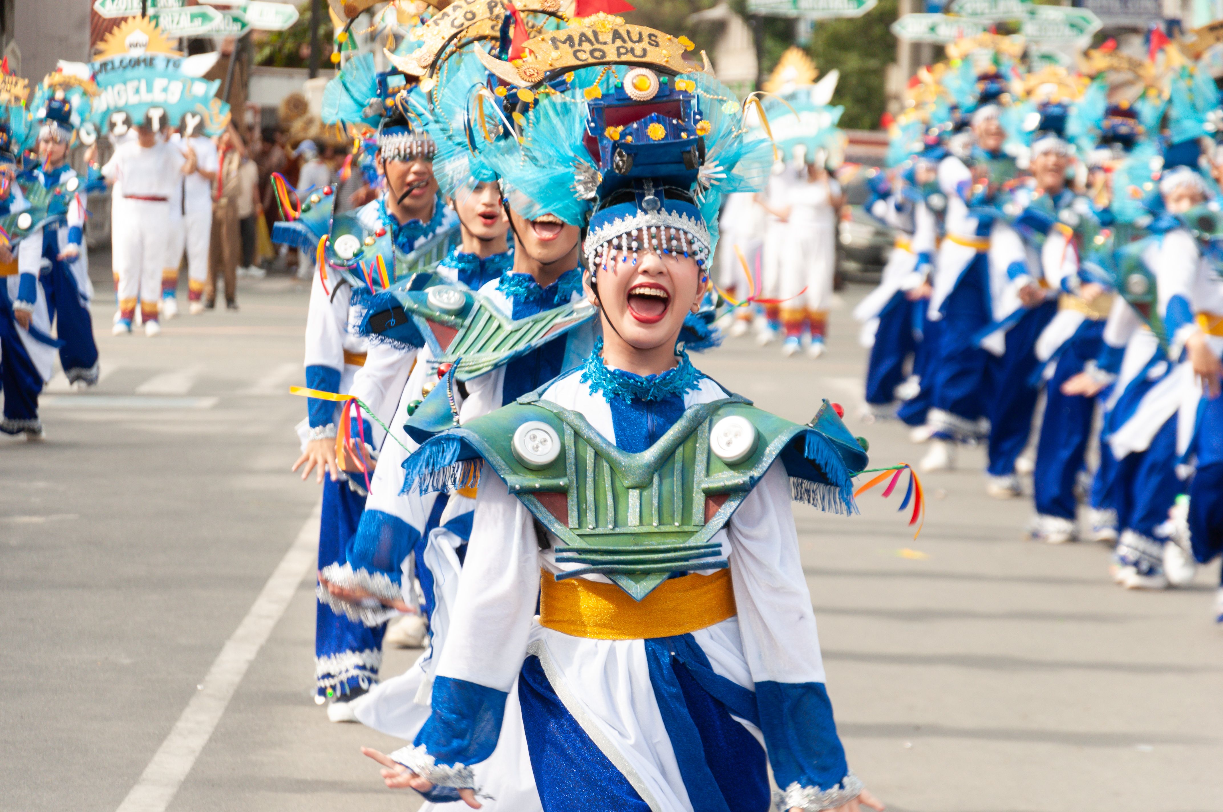 Vibrant Street Parade Celebration with Dancers · Free Stock Photo