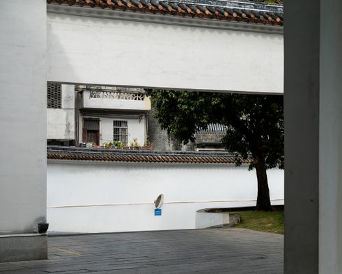 Free Captivating view of traditional Chinese architecture in Guangzhou, featuring classic brickwork and serene nature. Stock Photo