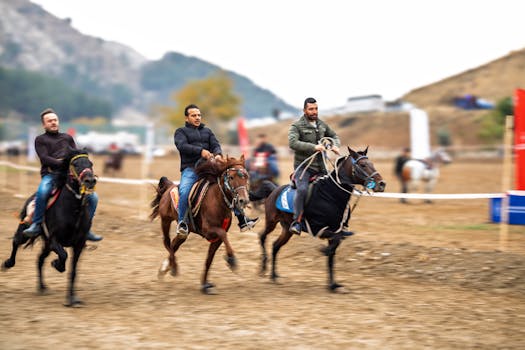 Captivating image of three men racing horses in scenic Adıyaman, Türkiye.