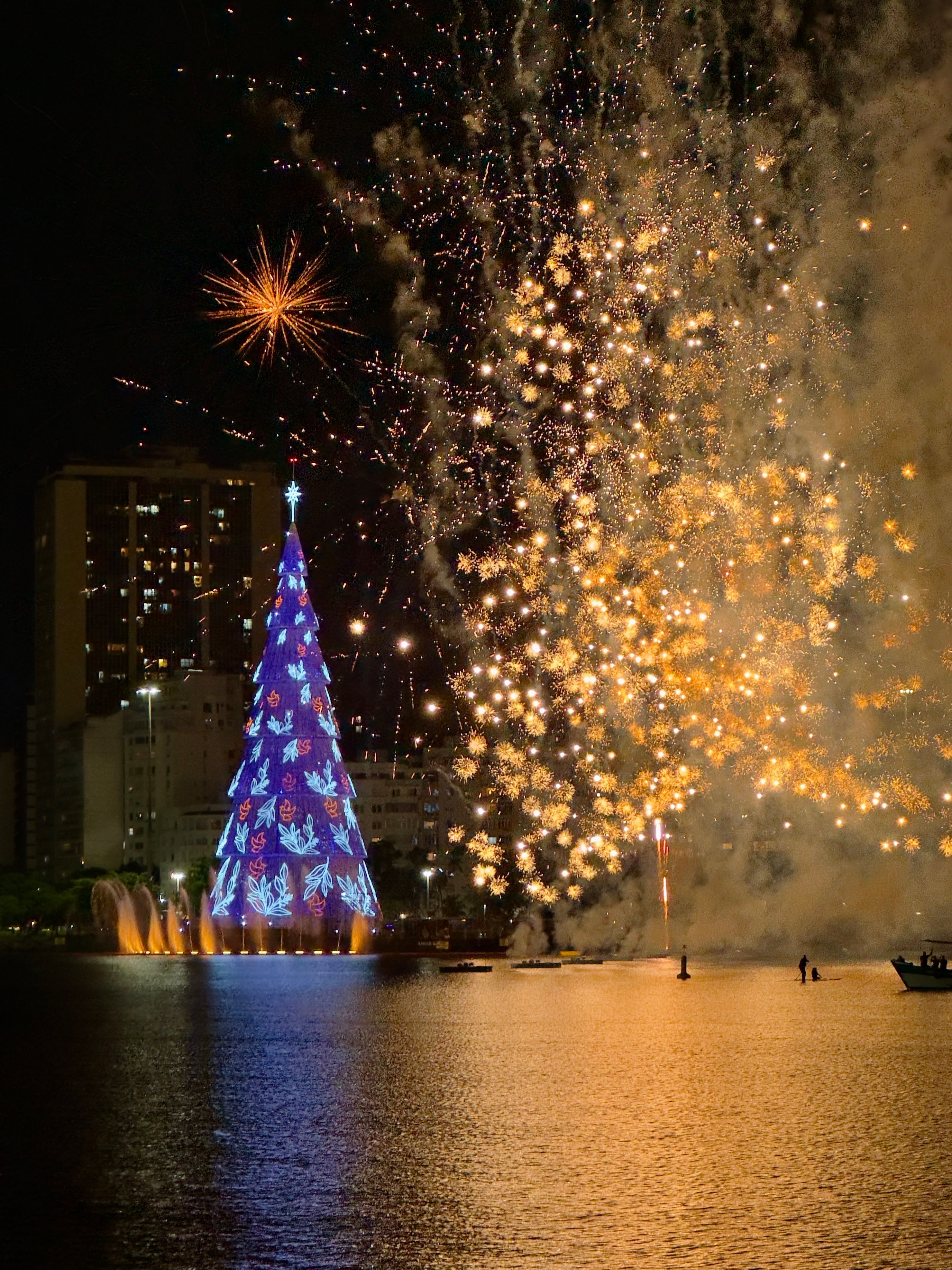 Spectacular fireworks display over Christmas tree at Rodrigo de Freitas Lagoon in Rio.