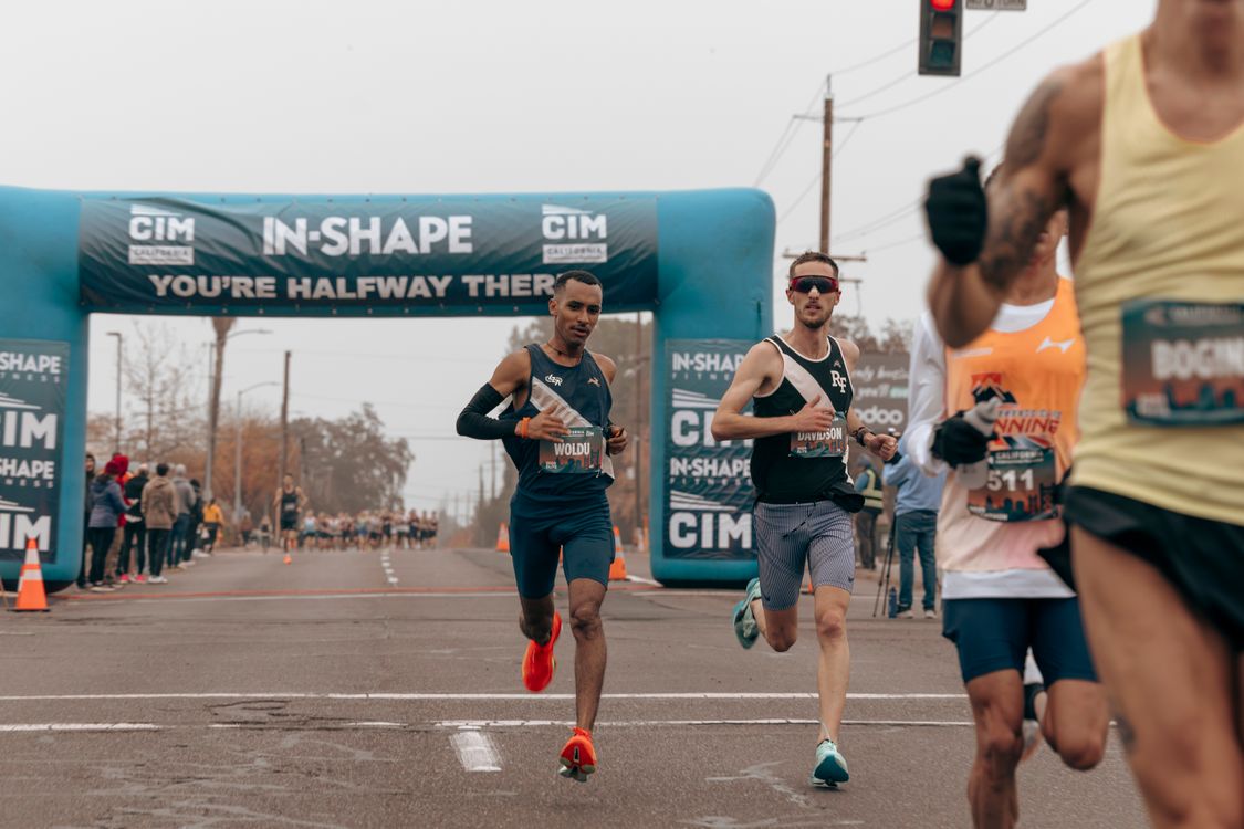 Competitive Marathon Runners in Action · Free Stock Photo