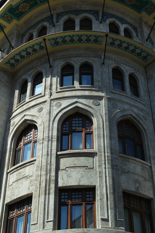 Free Close-up of ornate Ottoman building facade in İstanbul, showcasing intricate window designs. Stock Photo