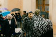 Festive street parade with masked performers in San Cristóbal de las Casas, Chiapas, Mexico.