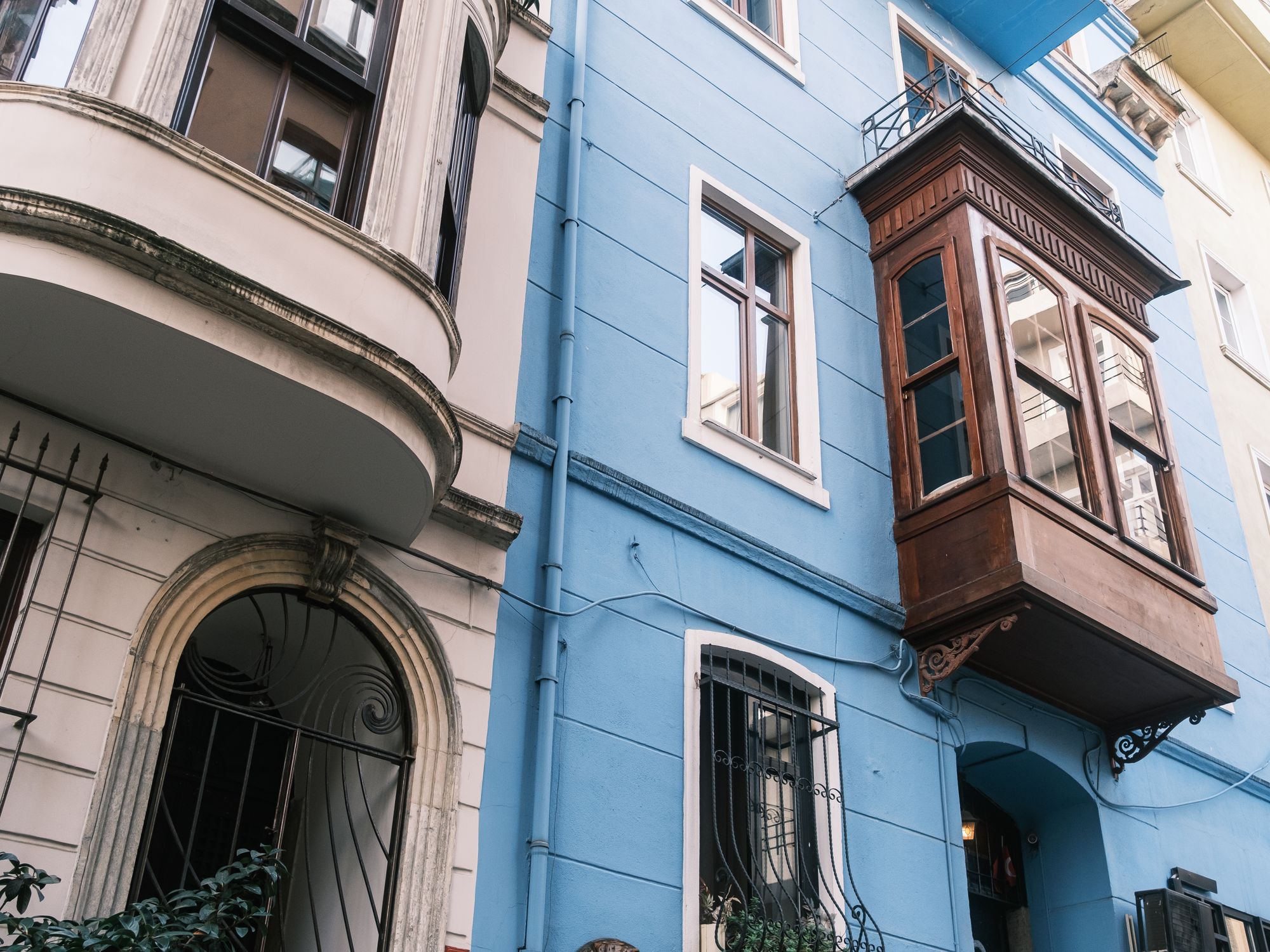 Exterior Painting in The Hyde, Barnet — painter refreshing a house exterior in weatherproof paint